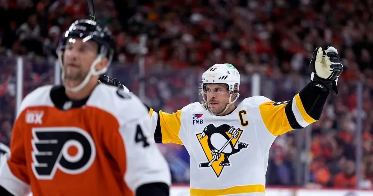 Pittsburgh Penguins player celebrating a goal against Flyers