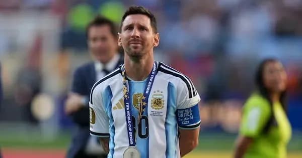 Messi wearing Argentina jersey with medal