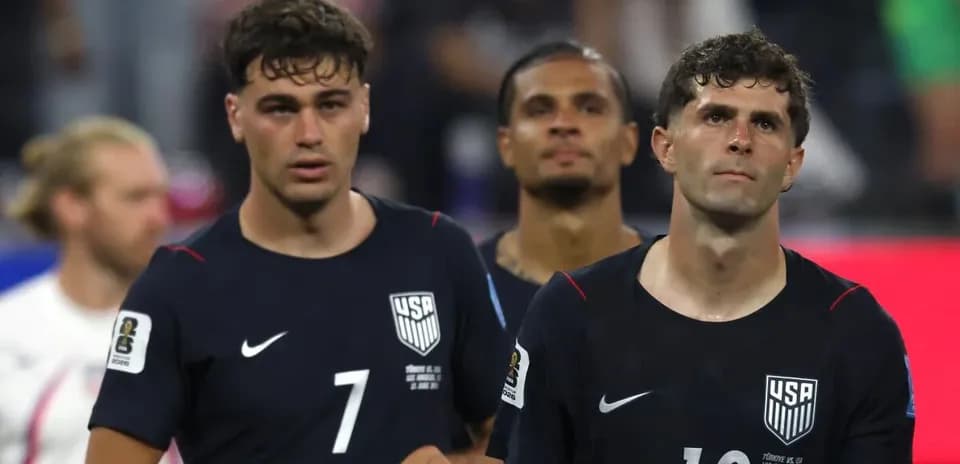 US players walking off the field after match