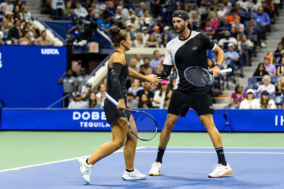 Tennis players celebrating a point during match