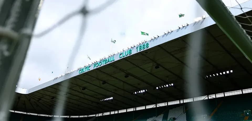 Celtic Park stadium viewed through goal net