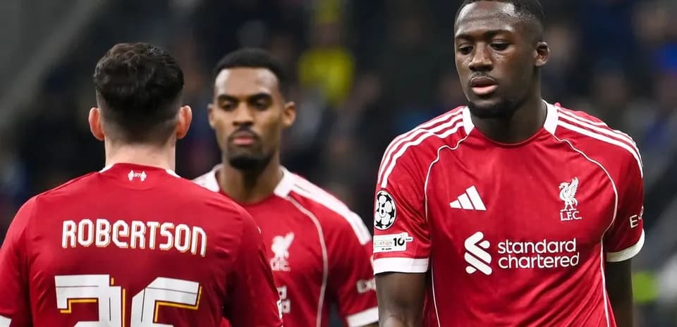 Liverpool players discussing during a match