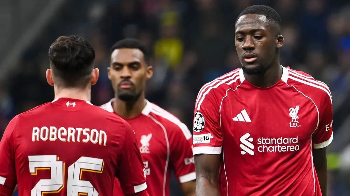 Liverpool players discussing during a match