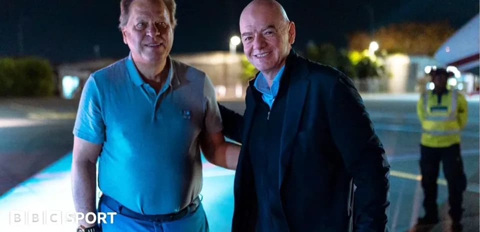 Two men posing together at night near aircraft