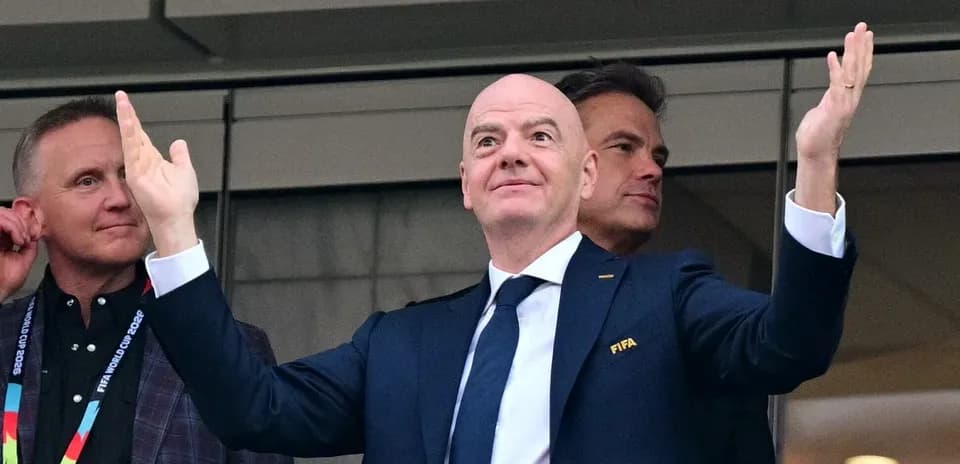 FIFA official gesturing during an event
