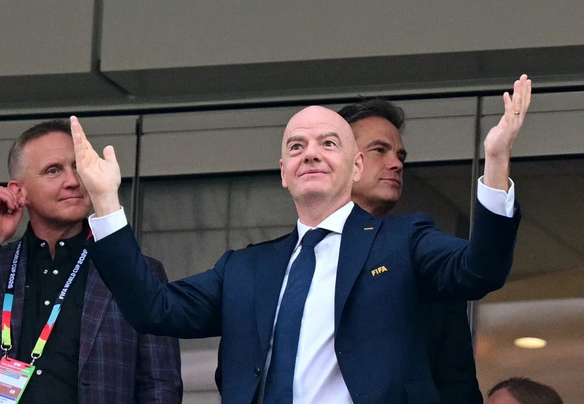 FIFA official gesturing during an event