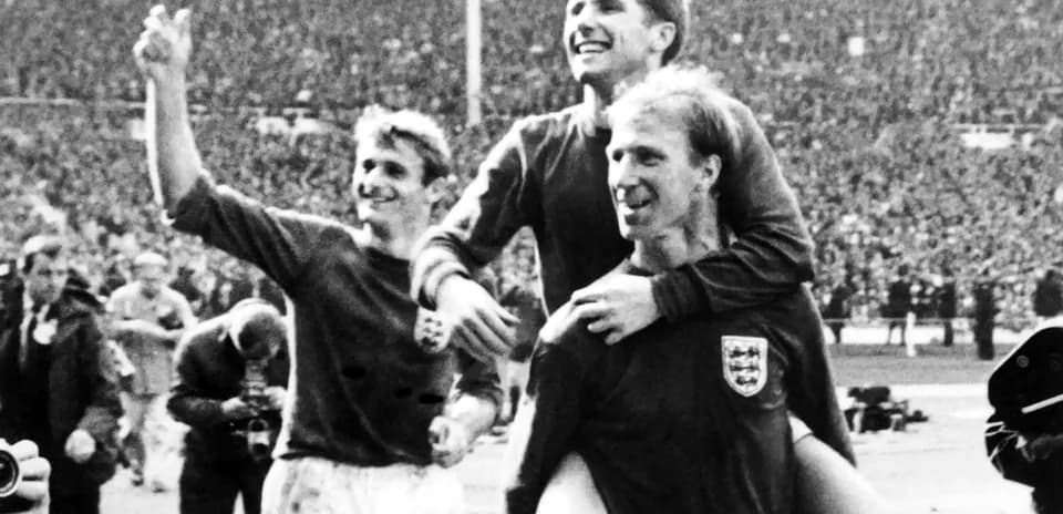 Football players celebrating victory on the field