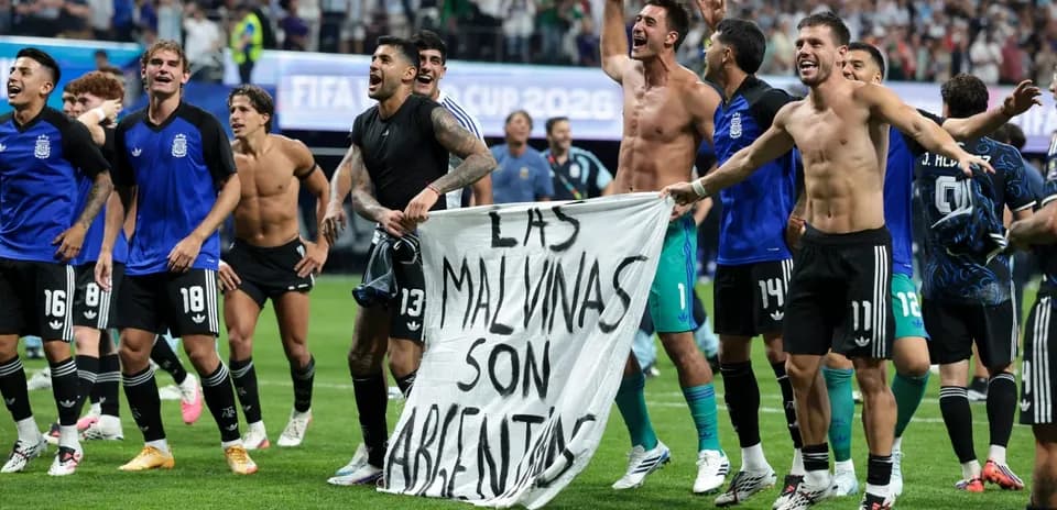 Argentinian players celebrating with a banner