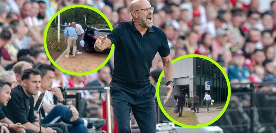Coach gesturing during match with spectators in background