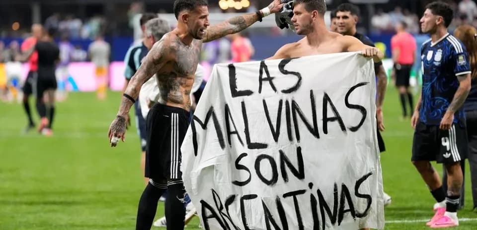 Players holding banner after match at FIFA World Cup