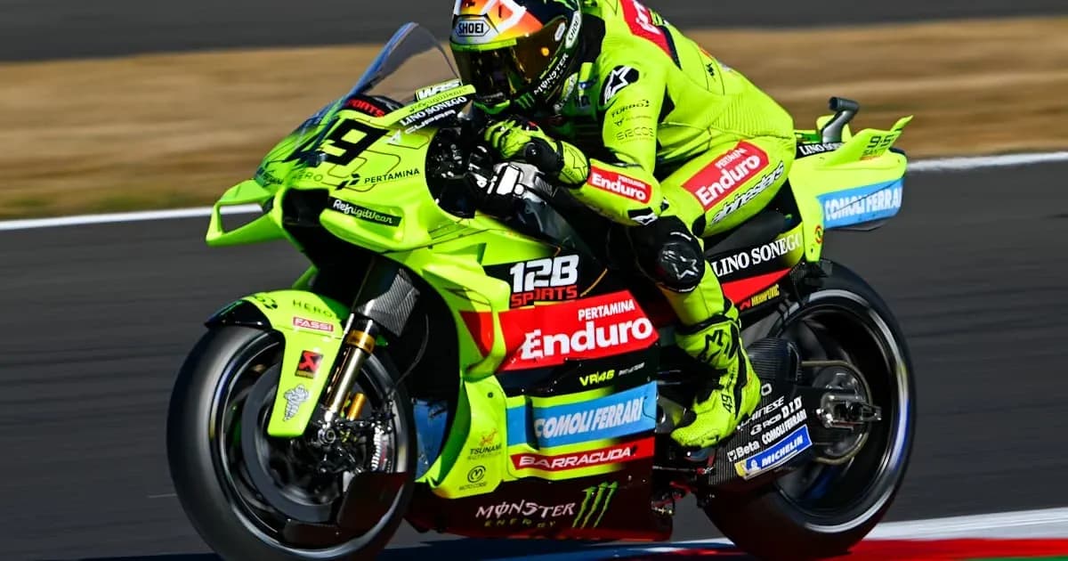 Motorcyclist racing on a bright green bike