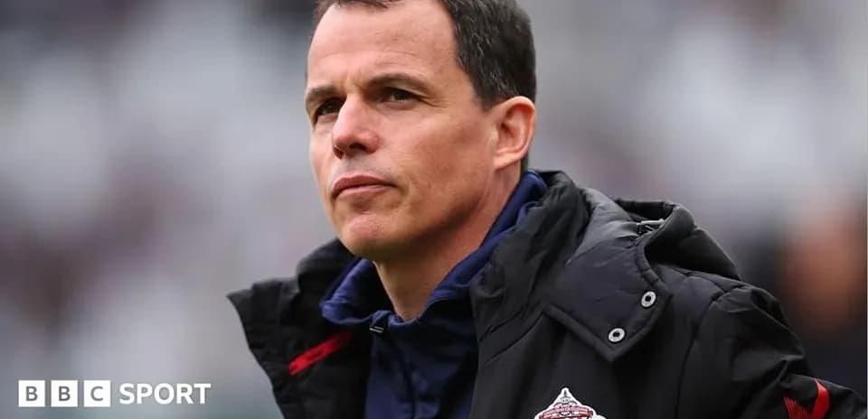 Sunderland manager observing the match from sidelines