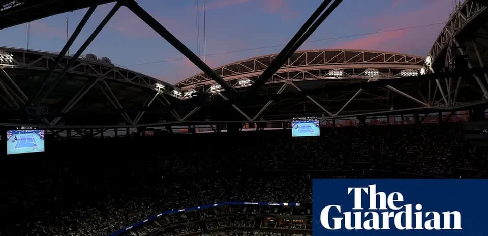 Stadium view with match display during sunset