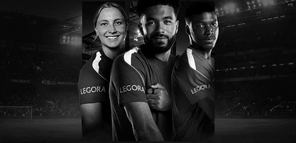 Chelsea FC players posing together in team jerseys
