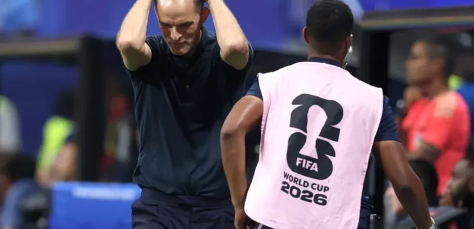 Coach showing frustration on the sidelines during match