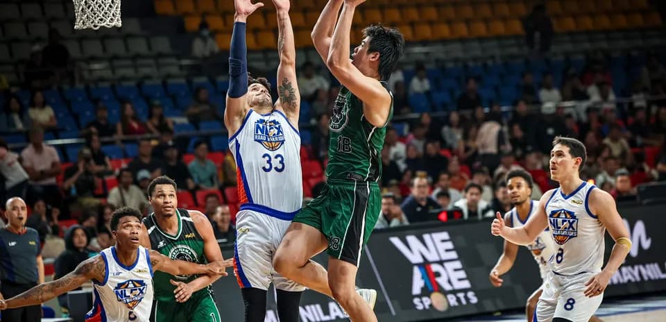 Player shooting during basketball game action
