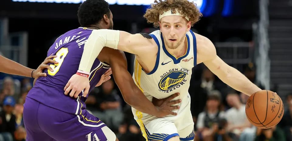 Player dribbling while being defended during game