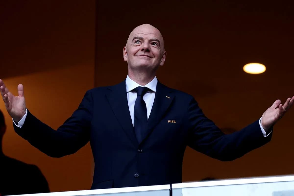 FIFA official gesturing from a viewing box FIFA official gesturing from a viewing box