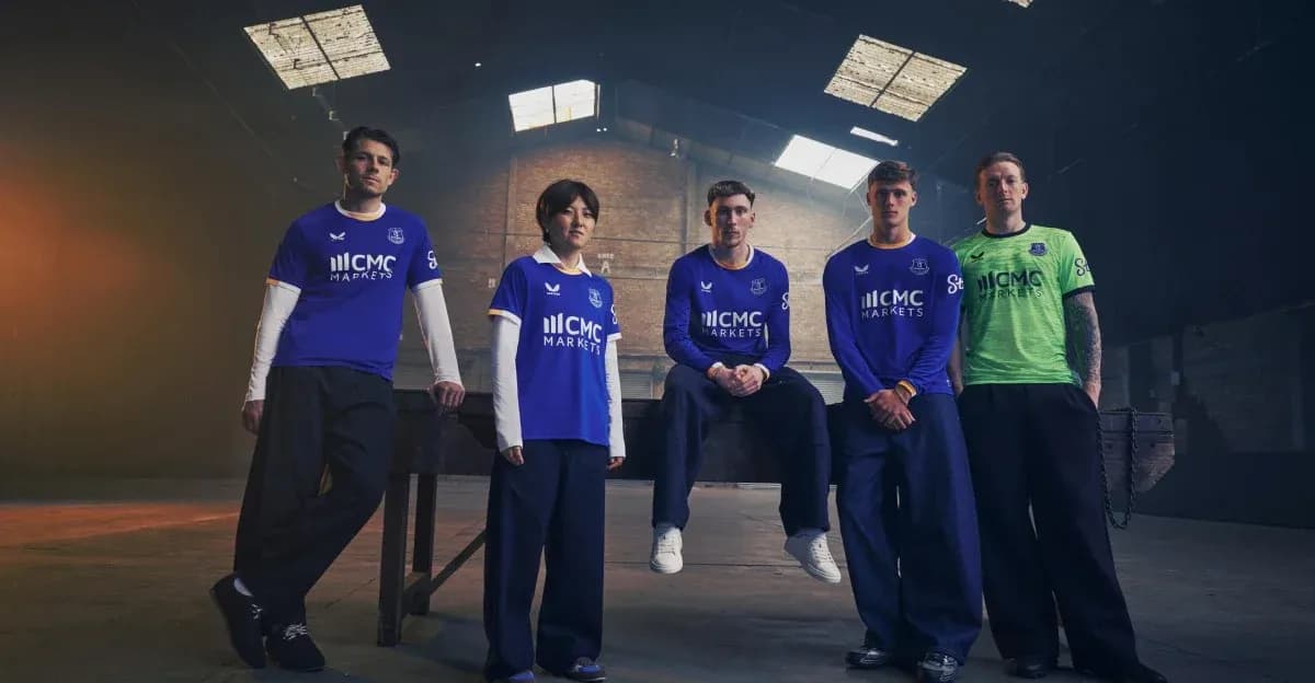 Everton players showcasing new team kits indoors Everton players showcasing new team kits indoors