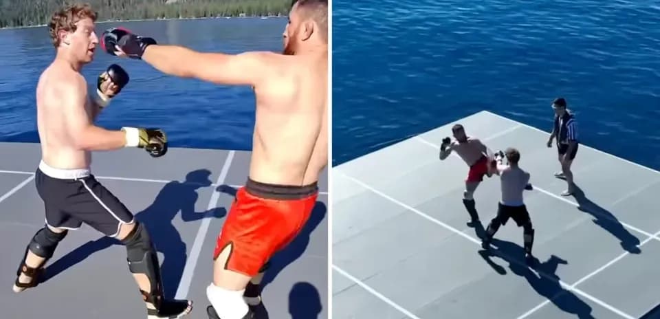 Two fighters boxing on a platform by the water