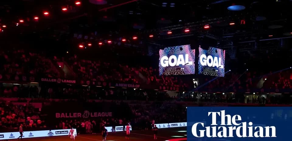 Stadium scene with 'GOAL' display during match