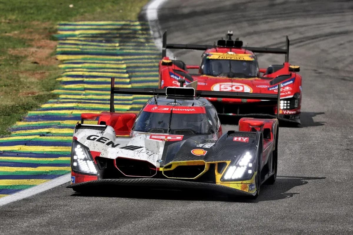 Two racing cars competing on a racetrack Two racing cars competing on a racetrack
