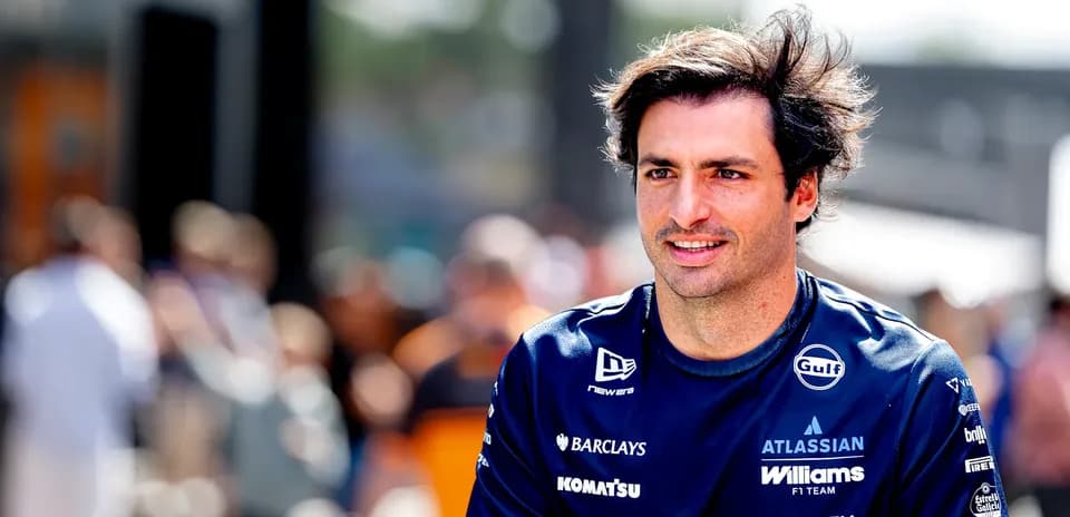 Pilot wearing Williams F1 Team shirt in paddock