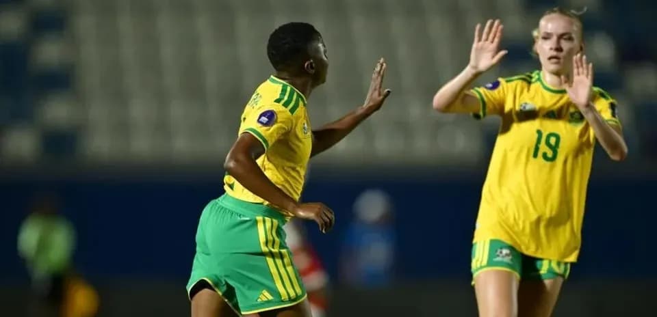 Two players interacting on the field during match