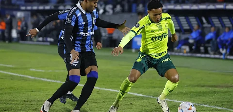 Two players contesting the ball during a match
