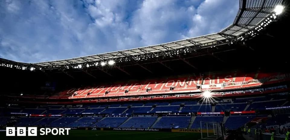 Stadium interior with empty seats and bright lights