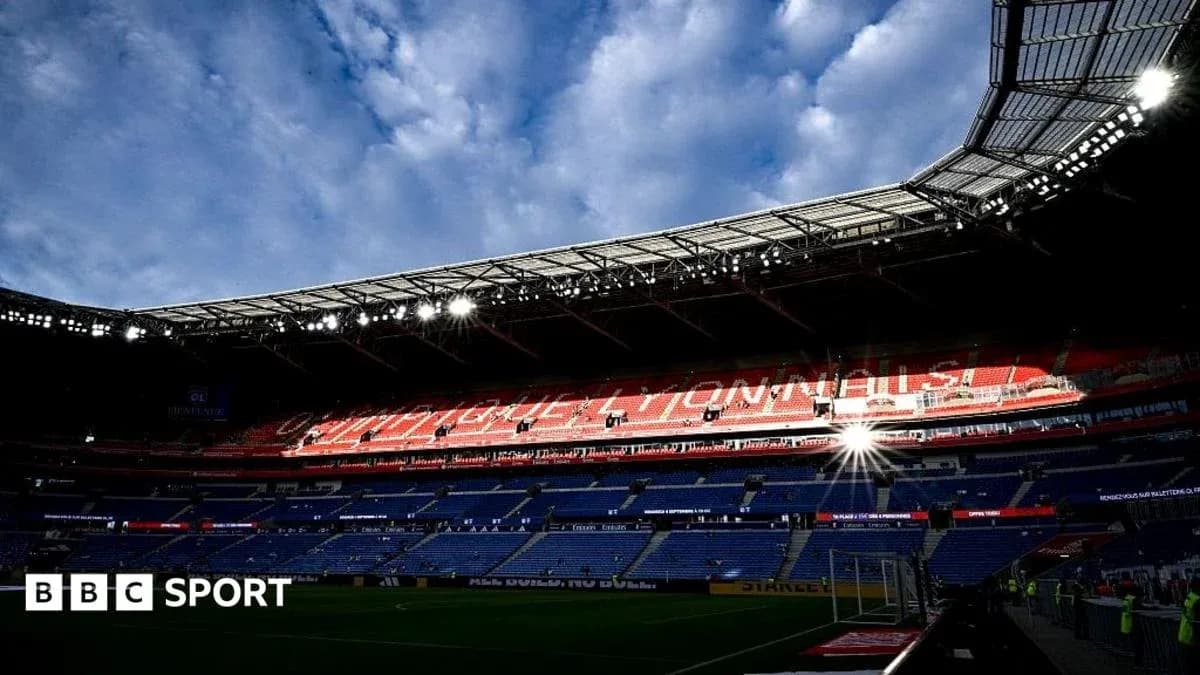 Stadium interior with empty seats and bright lights