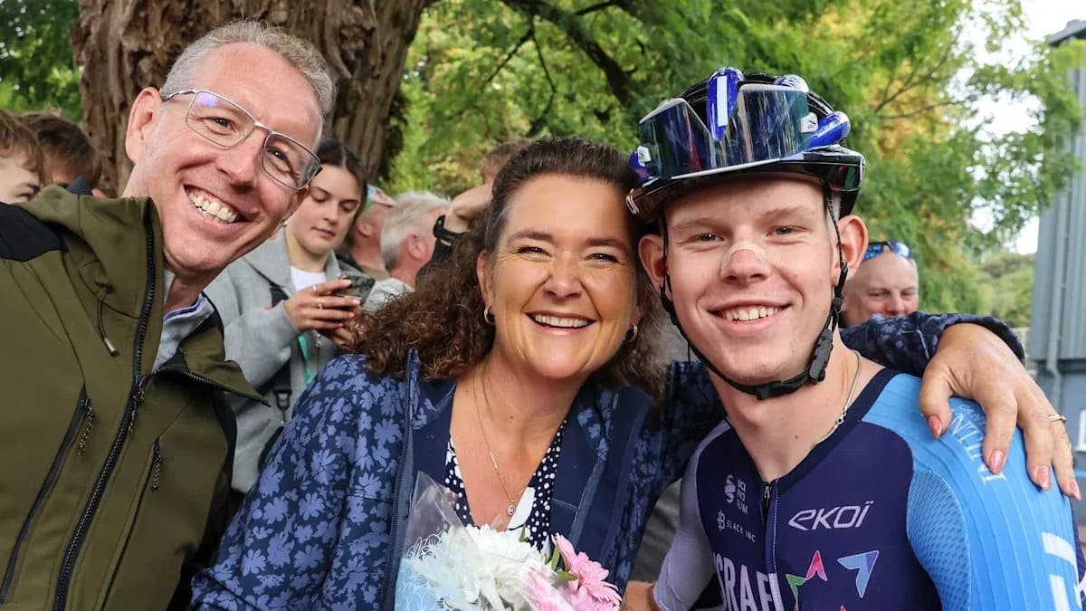 Cyclist posing with supporters after an event