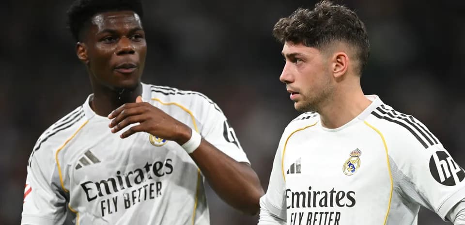 Real Madrid players discussing on the pitch