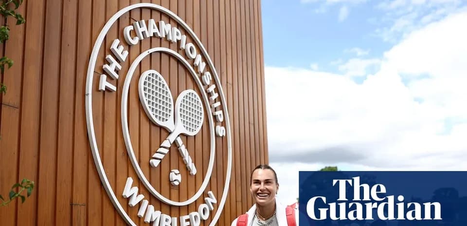 Tennis player smiling near Wimbledon Championships sign