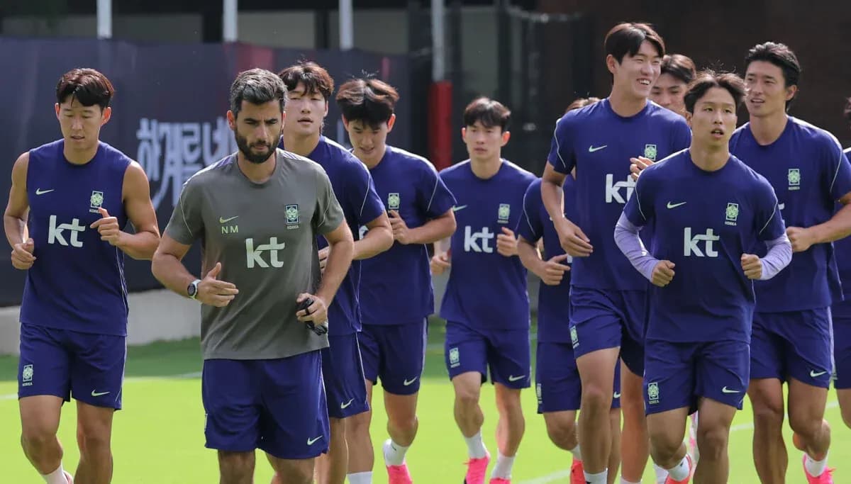 Korean football team jogging during training session Korean football team jogging during training session