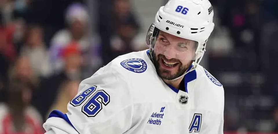 Hockey player smiling on the ice rink