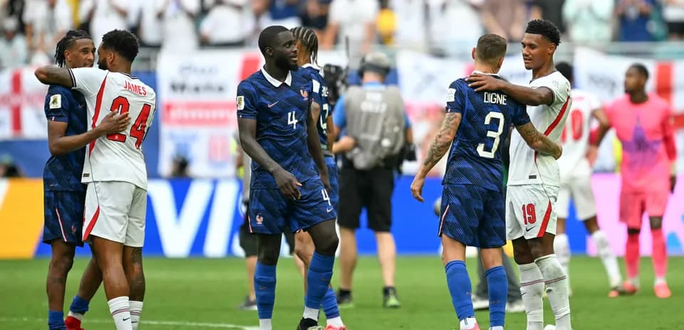 Players from France and opponent embracing after match