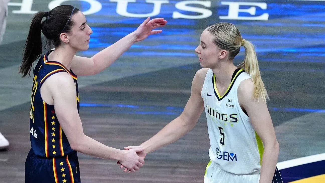 Two basketball players shaking hands post-game