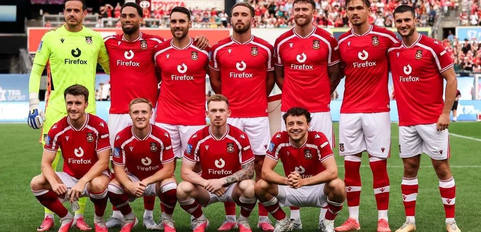 Wrexham AFC team posing before a match