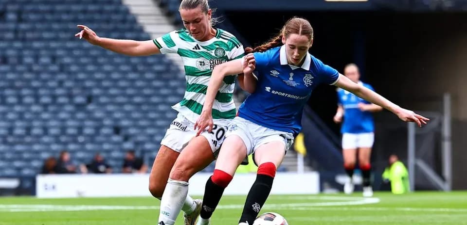 Celtic and Rangers players battling for the ball
