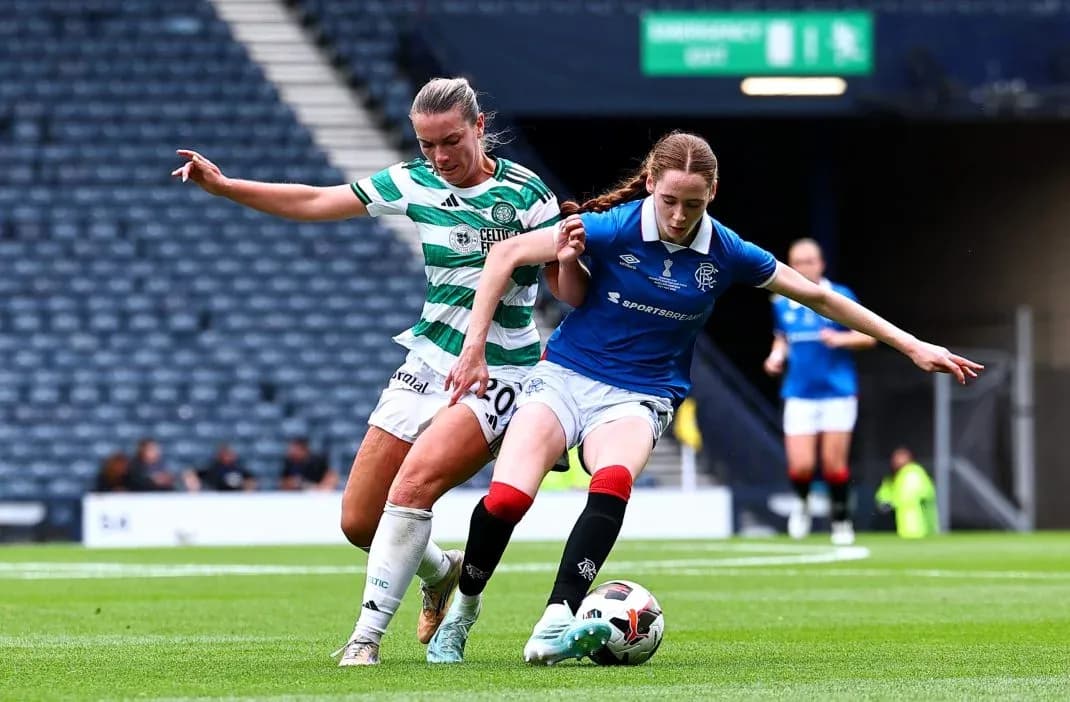 Celtic and Rangers players battling for the ball