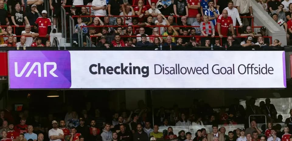 VAR display showing disallowed goal announcement in stadium