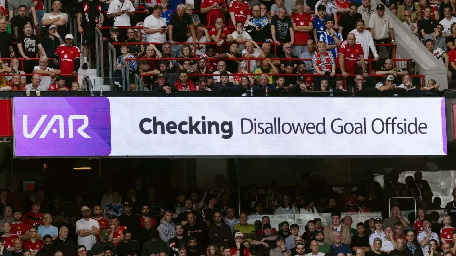 VAR display showing disallowed goal announcement in stadium