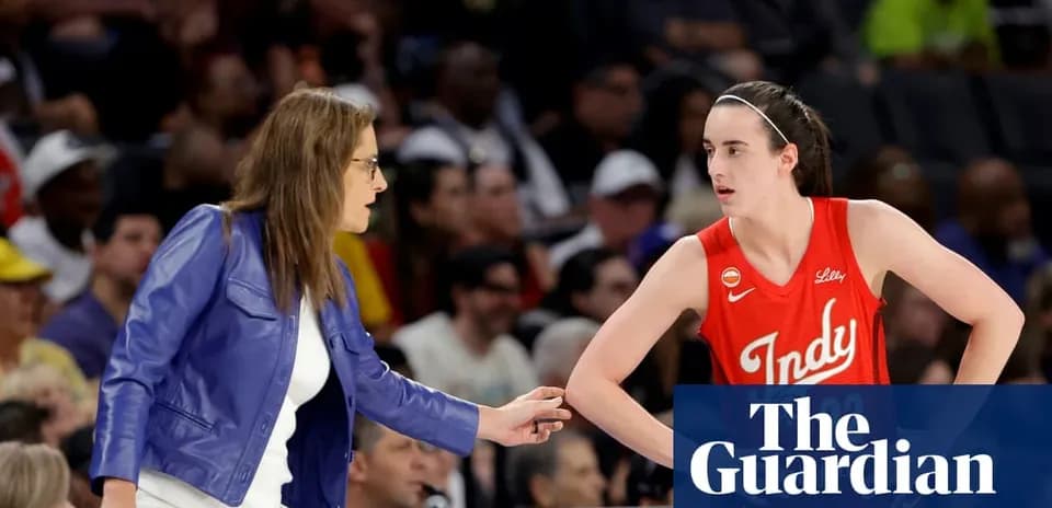 Coach discussing strategy with player during game