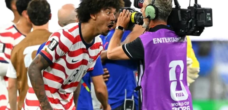 US player celebrating and interacting with cameraman