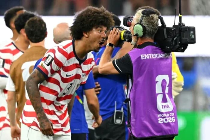 US player celebrating and interacting with cameraman