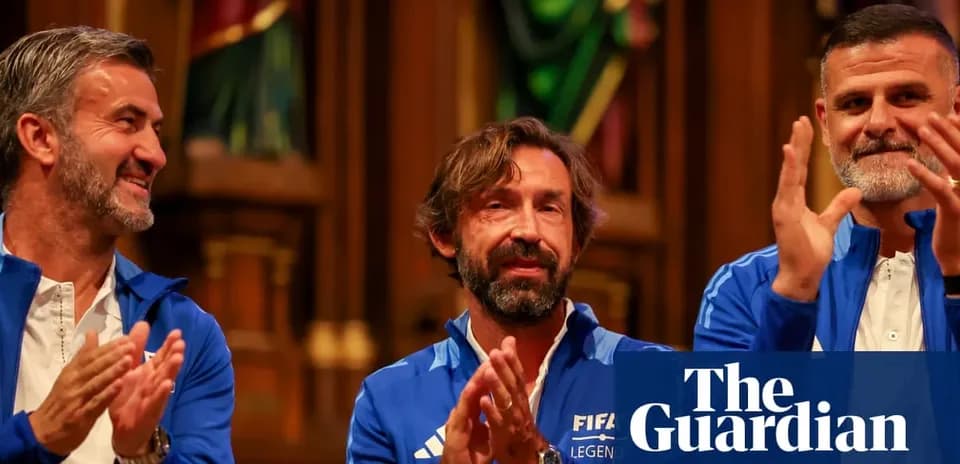 FIFA Legends event with three former players applauding