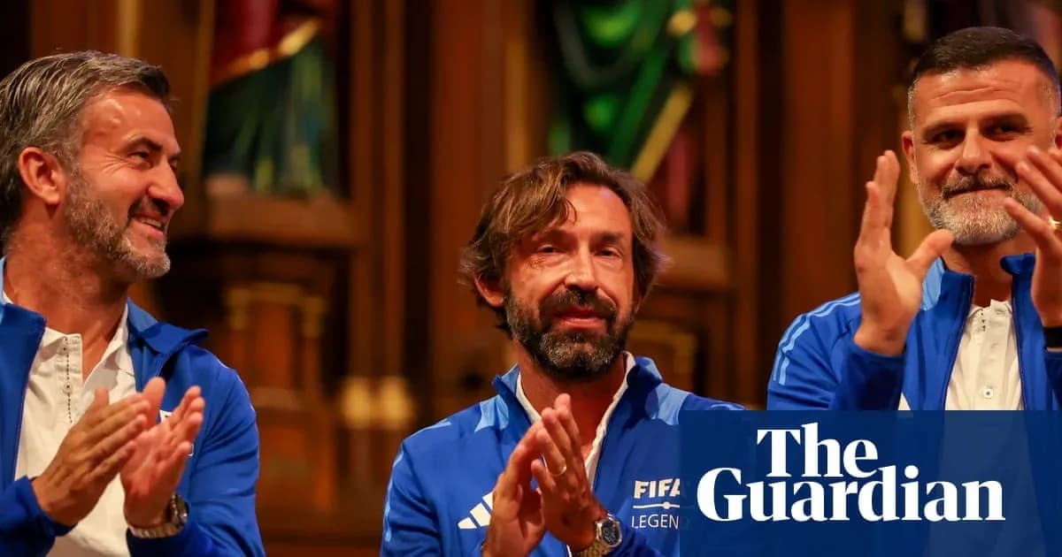 FIFA Legends event with three former players applauding