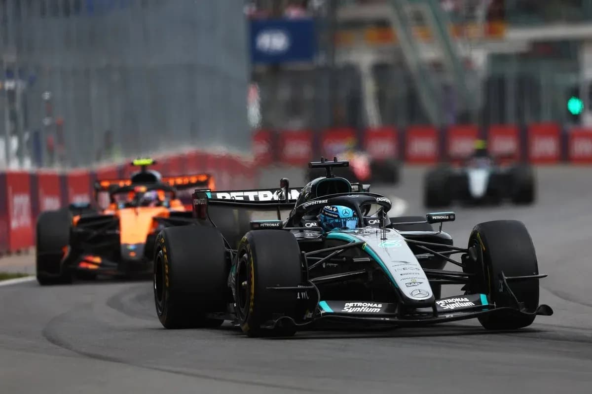 Mercedes car leading McLaren during Formula 1 race
