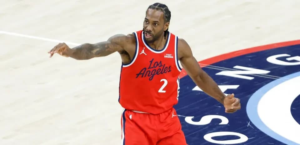 Basketball player signaling during a game